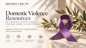 Domestic violence awareness ribbon alongside Mendes Law, PC information about domestic violence resources in Contra Costa County